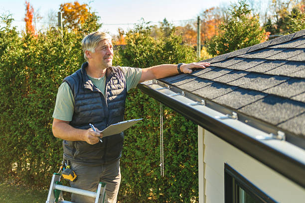 Professional Hail Damage Roof Repair technician working in Moline, IL
